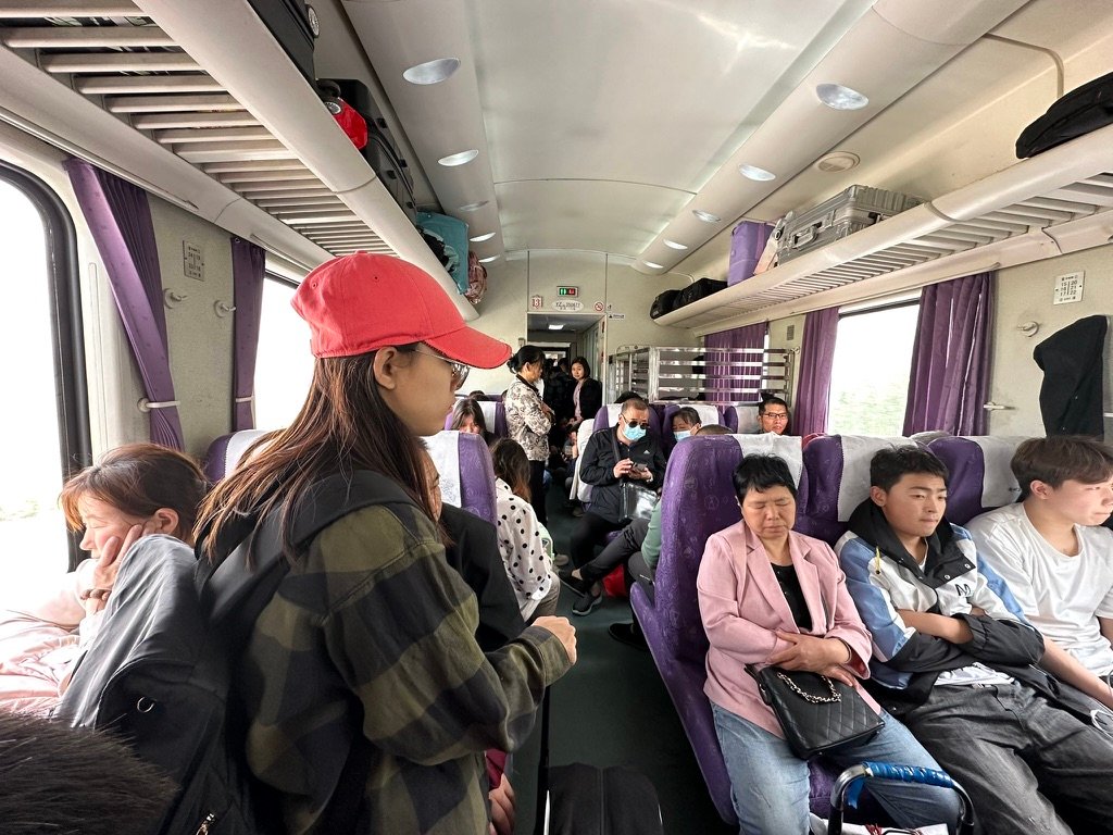 Elaine’s First Green Train in China — Then We Discovered We Had No Seats!